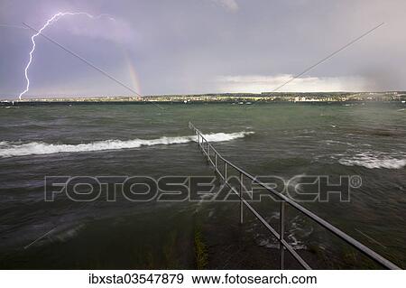 "Thunderstorm and evening light on Lake Constance, Lake Constance, Baden-Wurttemberg, Germany, Europe" View Large Photo Image Stock Photo - "Thunderstorm and evening light on Lake Constance, Lake Constance, Baden-Wurttemberg, Germany, Europe". Fotosearch
