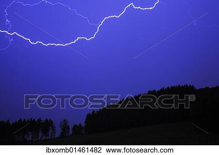 "Thunderstorms, lightning over hills" View Large Photo Image Stock Image - "Thunderstorms, lightning over hills". Fotosearch