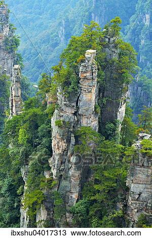 "Tianzishan mountain with vertical rock columns of quartz sandstone, Zhangjiajie National Park, Hunan Province, China, Asia" View Large Photo Image Stock Image - "Tianzishan mountain with vertical rock columns of quartz sandstone, Zhangjiajie National Park, Hunan Province, China, Asia". Fotosearch