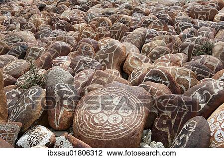 "Tibetan Buddhism, Mani stones with Tibetan script, former monastery of Nyengo Gompa above Lake Manasarovar, Mapham Yutsho, Kailash area, Ngari, Trans-Himalaya, Himalayas, West Tibet, Tibet Autonomous Region, People's Republic of China, Asia" View Large Photo Image Stock Image - "Tibetan Buddhism, Mani stones with Tibetan script, former monastery of Nyengo Gompa above Lake Manasarovar, Mapham Yutsho, Kailash area, Ngari, Trans-Himalaya, Himalayas, West Tibet, Tibet Autonomous Region, People's Republic of China, Asia". Fotosearch