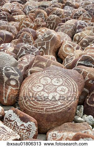 "Tibetan Buddhism, Mani stones with Tibetan script, former monastery of Nyengo Gompa above Lake Manasarovar, Mapham Yutsho, Kailash area, Ngari, Trans-Himalaya, Himalayas, West Tibet, Tibet Autonomous Region, People's Republic of China, Asia" View Large Photo Image Stock Image - "Tibetan Buddhism, Mani stones with Tibetan script, former monastery of Nyengo Gompa above Lake Manasarovar, Mapham Yutsho, Kailash area, Ngari, Trans-Himalaya, Himalayas, West Tibet, Tibet Autonomous Region, People's Republic of China, Asia". Fotosearch