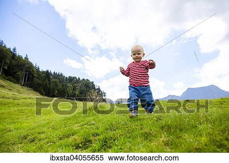 "Toddler, 18 months, during a summer hike in the Swiss Alpstein Mountains, Appenzell, Switzerland, Europe" View Large Photo Image Stock Photography - "Toddler, 18 months, during a summer hike in the Swiss Alpstein Mountains, Appenzell, Switzerland, Europe". Fotosearch