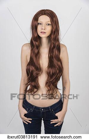 Topless woman wearing a wig with long hair View Large Photo Image Stock Image - Topless woman wearing a wig with long hair. Fotosearch