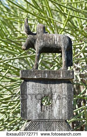 "Totem carved from wood, bull, arboretum of Tulear or Toliara, Madagascar, Africa" View Large Photo Image Stock Image - "Totem carved from wood, bull, arboretum of Tulear or Toliara, Madagascar, Africa". Fotosearch