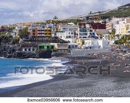 Stock Photograph - "Tourists on the black beach of Puerto Naos, La Palma, Canary Islands, Spain, Europe". Fotosearch