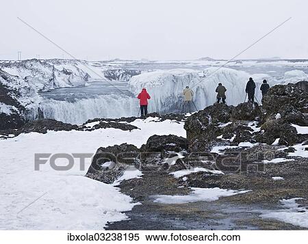 "Tourists taking pictures of the Godafoss waterfall, Godafoss, Gemeinde Pingeyjarsveit, North Iceland, Iceland, Europe" View Large Photo Image Stock Photography - "Tourists taking pictures of the Godafoss waterfall, Godafoss, Gemeinde Pingeyjarsveit, North Iceland, Iceland, Europe". Fotosearch