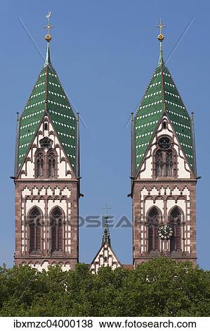 "Towers of the Herz Jesu-Kirche, or Sacred Heart Church, built in the style of Historicism, consecrated in 1897, Freiburg, Baden-Wurttemberg, Germany, Europe" View Large Photo Image Stock Photo - "Towers of the Herz Jesu-Kirche, or Sacred Heart Church, built in the style of Historicism, consecrated in 1897, Freiburg, Baden-Wurttemberg, Germany, Europe". Fotosearch
