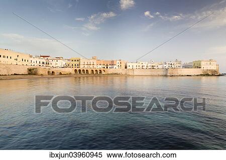 "Town beach and historic centre in the evening light, Gulf of Taranto, Gallipoli, Province of Lecce, Apulia, Italy, Europe" View Large Photo Image Stock Photography - "Town beach and historic centre in the evening light, Gulf of Taranto, Gallipoli, Province of Lecce, Apulia, Italy, Europe". Fotosearch