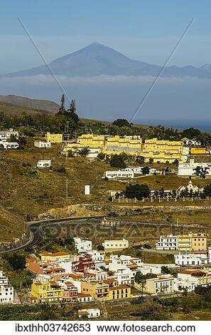 "Town of Playa de Santiago, Mount Teide or Pico del Teide at back, Playa de Santiago, La Gomera, Canary Islands, Spain, Europe" View Large Photo Image Stock Image - "Town of Playa de Santiago, Mount Teide or Pico del Teide at back, Playa de Santiago, La Gomera, Canary Islands, Spain, Europe". Fotosearch