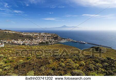 "Town of San Sebastian, Mount Teide or Pico del Teide at back, San Sebastian de la Gomera, La Gomera, Canary Islands, Spain, Europe" View Large Photo Image Stock Image - "Town of San Sebastian, Mount Teide or Pico del Teide at back, San Sebastian de la Gomera, La Gomera, Canary Islands, Spain, Europe". Fotosearch