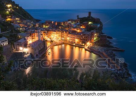 Stock Photograph - "Townscape at dusk, Vernazza, Cinque Terre, Liguria, Italy, Europe". Fotosearch
