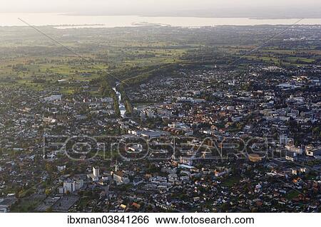 Stock Photograph - "Townscape of Dornbirn, Lake Constance at the back, seen from Karren mountain, Dornbirn, Vorarlberg, Rhine Valley, Austria, Europe". Fotosearch