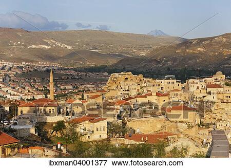 "Townscape, Urgup, Mount Erciyes volcano at the back, Nevsehir Province, Cappadocia, Central Anatolia Region, Anatolia, Turkey, Asia" View Large Photo Image Stock Photo - "Townscape, Urgup, Mount Erciyes volcano at the back, Nevsehir Province, Cappadocia, Central Anatolia Region, Anatolia, Turkey, Asia". Fotosearch