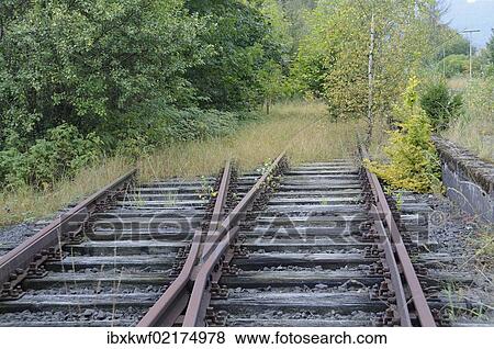 "Tracks running into the countryside at a disused railway station on a regional route from Marburg - Erdtebrueck, Sassmannshausen, Bad Laasphe, district of Siegen-Wittgenstein, North Rhine-Westphalia, Germany, Europe" View Large Photo Image Stock Photo - "Tracks running into the countryside at a disused railway station on a regional route from Marburg - Erdtebrueck, Sassmannshausen, Bad Laasphe, district of Siegen-Wittgenstein, North Rhine-Westphalia, Germany, Europe". Fotosearch