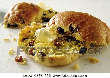 Traditional British safron bun with butter View Large Photo Image Stock Photograph - Traditional British safron bun with butter. Fotosearch