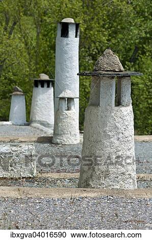Stock Image - "Traditional chimneys on the roofs of Capileira, Alpujarras, Sierra Nevada, Spain, Europe". Fotosearch