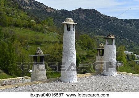 Stock Photo - "Traditional chimneys on the roofs of Capileira, Alpujarras, Sierra Nevada, Spain, Europe". Fotosearch