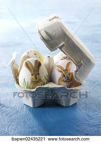 Traditional painted Easter eggs in an egg carton View Large Photo Image Stock Image - Traditional painted Easter eggs in an egg carton. Fotosearch