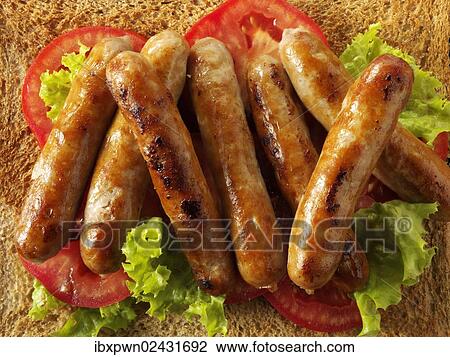 Traditional pork chipolata sausages View Large Photo Image Stock Image - Traditional pork chipolata sausages. Fotosearch