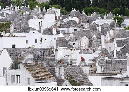 "Traditional trulli round houses, Trullostadt, Rione Monti, Alberobello, Valle d'Itria, Trulli Valley, Apulia, Italy, Europe" View Large Photo Image Stock Image - "Traditional trulli round houses, Trullostadt, Rione Monti, Alberobello, Valle d'Itria, Trulli Valley, Apulia, Italy, Europe". Fotosearch