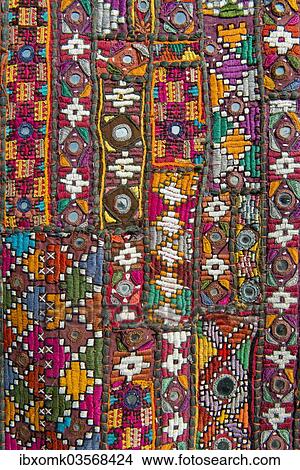"Traditional wall hanging from Rajasthan, colourful, inlaid with mirrors and different patterns, detail, Udaipur, Rajasthan, India, Asia" View Large Photo Image Picture - "Traditional wall hanging from Rajasthan, colourful, inlaid with mirrors and different patterns, detail, Udaipur, Rajasthan, India, Asia". Fotosearch