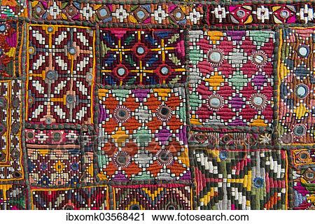 "Traditional wall hanging from Rajasthan, colourful, inlaid with mirrors and different patterns, detail, Udaipur, Rajasthan, India, Asia" View Large Photo Image Stock Image - "Traditional wall hanging from Rajasthan, colourful, inlaid with mirrors and different patterns, detail, Udaipur, Rajasthan, India, Asia". Fotosearch