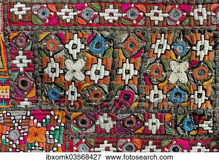 "Traditional wall hanging from Rajasthan, colourful, inlaid with mirrors and different patterns, detail, Udaipur, Rajasthan, India, Asia" View Large Photo Image Stock Photo - "Traditional wall hanging from Rajasthan, colourful, inlaid with mirrors and different patterns, detail, Udaipur, Rajasthan, India, Asia". Fotosearch