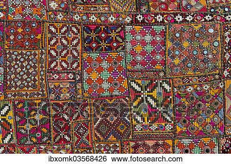 "Traditional wall hanging from Rajasthan, colourful, inlaid with mirrors and different patterns, detail, Udaipur, Rajasthan, India, Asia" View Large Photo Image Stock Photograph - "Traditional wall hanging from Rajasthan, colourful, inlaid with mirrors and different patterns, detail, Udaipur, Rajasthan, India, Asia". Fotosearch