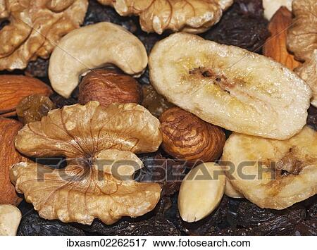 "Trail mix with walnuts, dried banana chips, hazelnuts, cashews and raisins" View Large Photo Image Stock Photo - "Trail mix with walnuts, dried banana chips, hazelnuts, cashews and raisins". Fotosearch