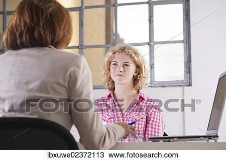 Trainee during an interview with a personnel manager View Large Photo Image Stock Image - Trainee during an interview with a personnel manager. Fotosearch