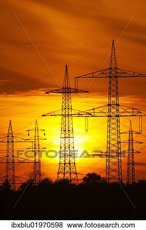 "Transmission lines, overhead line towers, with setting sun, Beinstein in Stuttgart, Baden-Wuerttemberg, Germany, Europe" View Large Photo Image Stock Photo - "Transmission lines, overhead line towers, with setting sun, Beinstein in Stuttgart, Baden-Wuerttemberg, Germany, Europe". Fotosearch