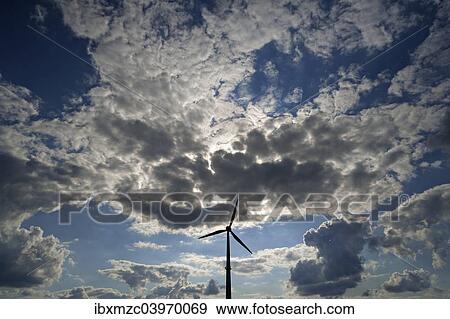 "tratocumulus and a wind turbine as a silhouette, Karsberg, Upper Franconia, Bavaria, Germany, Europe" View Large Photo Image Stock Photo - "tratocumulus and a wind turbine as a silhouette, Karsberg, Upper Franconia, Bavaria, Germany, Europe". Fotosearch