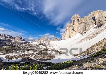 Stock Image - "Tre Cime di Lavaredo or Drei Zinnen, view from mountain pass Col de Medo, Sexten Dolomites, Sesto Dolomites, South Tyrol, Italy, Europe". Fotosearch