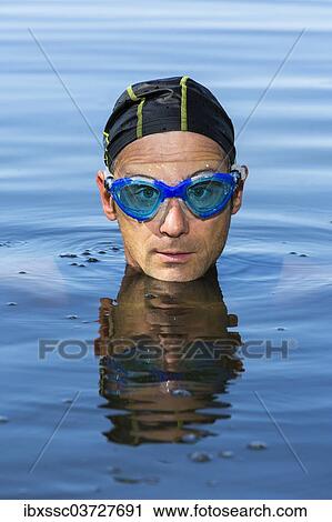 "Triathlete in water, Welzheim, Baden-Wurttemberg, Germany, Europe" View Large Photo Image Stock Image - "Triathlete in water, Welzheim, Baden-Wurttemberg, Germany, Europe". Fotosearch