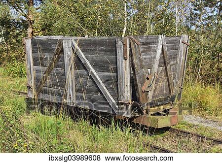 "Trolley of a narrow-gauge railway, formerly used for transporting peat, former Nicklheim peat factory, Nicklheim, Upper Bavaria, Bavaria, Germany, Europe" View Large Photo Image Stock Photo - "Trolley of a narrow-gauge railway, formerly used for transporting peat, former Nicklheim peat factory, Nicklheim, Upper Bavaria, Bavaria, Germany, Europe". Fotosearch
