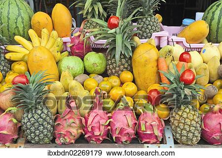 "Tropical fruit display outside juice shop, Vientiane, Laos, Southeast Asia, Asia" View Large Photo Image Stock Photo - "Tropical fruit display outside juice shop, Vientiane, Laos, Southeast Asia, Asia". Fotosearch
