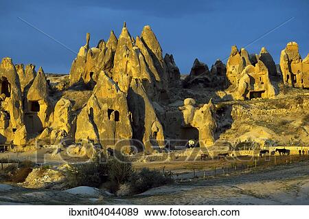 Stock Photo - "Tufa formations in the evening light, Goreme National Park, Goreme, Nevsehir Province, Cappadocia, Turkey, Asia". Fotosearch