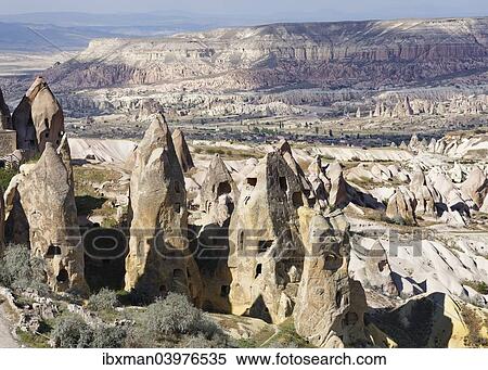 "Tufa formations, Pigeon Valley or Guvercin Vadisi, in Uchisar, behind Goreme valley, Goreme National Park, Cappadocia, Central Anatolia Region, Anatolia, Turkey, Asia" View Large Photo Image Stock Photography - "Tufa formations, Pigeon Valley or Guvercin Vadisi, in Uchisar, behind Goreme valley, Goreme National Park, Cappadocia, Central Anatolia Region, Anatolia, Turkey, Asia". Fotosearch