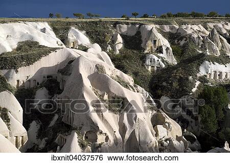 "Tufa formations with cave dwellings, Pigeon Valley, Guvercinlik, Nevsehir Province, Cappadocia, Turkey, Asia" View Large Photo Image Stock Photograph - "Tufa formations with cave dwellings, Pigeon Valley, Guvercinlik, Nevsehir Province, Cappadocia, Turkey, Asia". Fotosearch