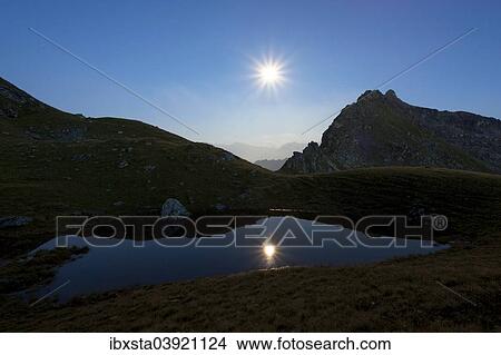 "Twilight at Berglimattsee Lake with a full moon, Canton of Glarus, Switzerland, Europe" View Large Photo Image Picture - "Twilight at Berglimattsee Lake with a full moon, Canton of Glarus, Switzerland, Europe". Fotosearch