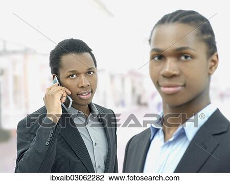 "Two businessmen, business partners" View Large Photo Image Stock Image - "Two businessmen, business partners". Fotosearch