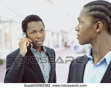 "Two businessmen, business partners" View Large Photo Image Stock Image - "Two businessmen, business partners". Fotosearch