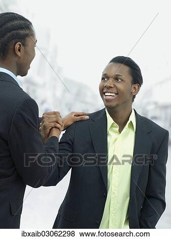 "Two businessmen, business partners" View Large Photo Image Stock Photo - "Two businessmen, business partners". Fotosearch