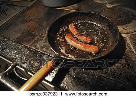 "Two Franconian sausages in an old cast iron skillet on an old stove, Middle Franconia, Bavaria, Germany, Europe" View Large Photo Image Stock Image - "Two Franconian sausages in an old cast iron skillet on an old stove, Middle Franconia, Bavaria, Germany, Europe". Fotosearch