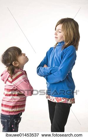 Stock Photo - Two girls arguing. Fotosearch