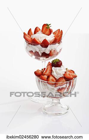 Two glass bowls with strawberries and cream View Large Photo Image Stock Image - Two glass bowls with strawberries and cream. Fotosearch