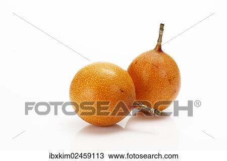 Stock Image - Two Granadillas or Passion Fruit (Passiflora caerulea). Fotosearch