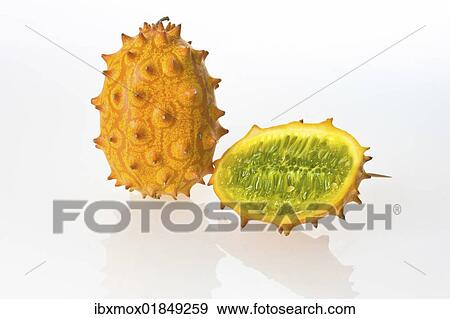 "Two Kiwanos, Horned Melons or African Horned Cucumbers (Cucumis metuliferus), one cut in half" View Large Photo Image Stock Photo - "Two Kiwanos, Horned Melons or African Horned Cucumbers (Cucumis metuliferus), one cut in half". Fotosearch