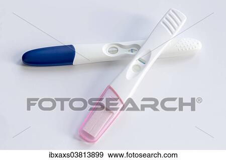 Stock Photo - "Two positive pregnancy tests, lying on top of each other". Fotosearch
