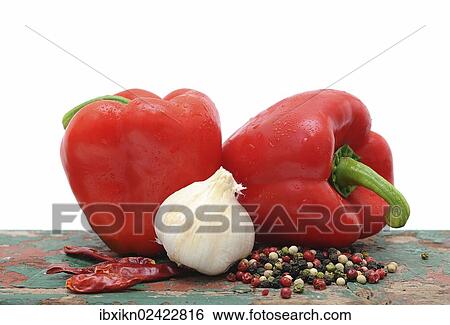 "Two red capsicums, garlic and peppercorns" View Large Photo Image Stock Photograph - "Two red capsicums, garlic and peppercorns". Fotosearch